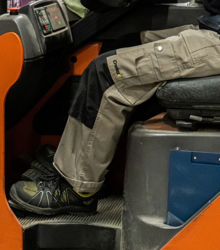 A pair of warehouse work shoes with steel toe caps and slip resistant soles